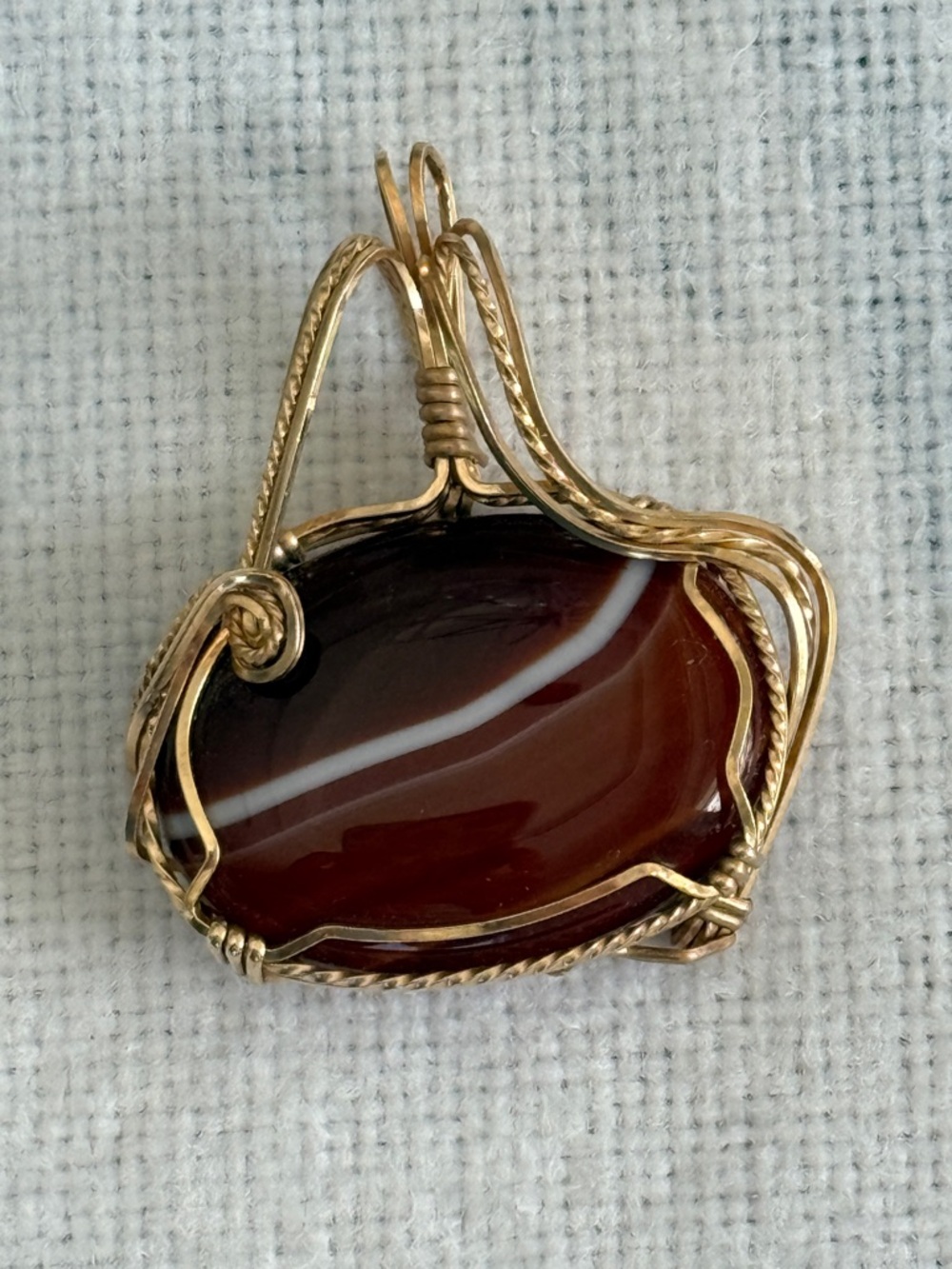 Agate necklace pendant with goldtone wire wrap